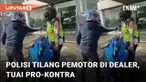Media sosial dibuat heboh dengan video cekcok antara pemotor dan polisi lalu lintas. Terekam dari kamera warga, polisi menilang pemotor di sebuah dealer. Pemotor tak terima motor sportnya yang berwarna biru ditahan polisi. Insiden menuai pro dan kont...