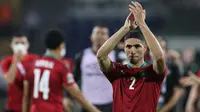 Maroko sukses mengambil alih keunggulan di babak kedua, tepatnya pada menit ke-70. Achraf Hakimi yang ditunjuk sebagai eksekutor tendangan bebas sukses menyarangkan bola ke gawang Malawi yang dijaga Charles Thom. Skor berubah menjadi 2-1 dan bertahan hingga laga usai. (AFP/Kenzo Tribouillard)