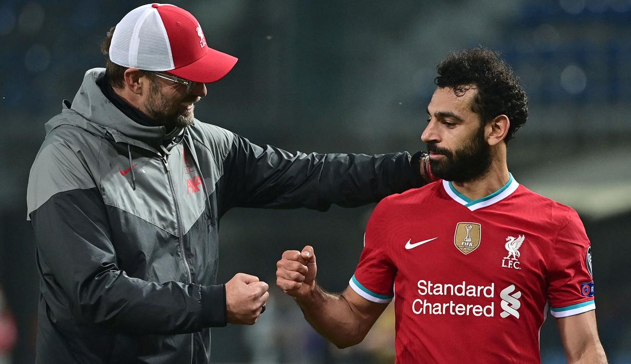 Mohamed Salah menjadi penyerang terbaik hasil polesan Jurgen Klopp. Didatangkan pada 2017 dari AS Roma, ia menjadi sosok tangguh di lini serang dengan kemampuan dribbling dan kontribusi golnya. Salah tercatat telah mencetak 148 gol dan 59 assist dalam 229 laga bersama The Reds. (AFP/Miguel Medina)