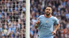 Gelandang Manchester City, Riyad Mahrez berselebrasi setelah mencetak gol ke gawang Sheffield United pada pertandingan semifinal Piala FA di stadion Wembley, di London, Sabtu, 22 April 2023. (AP Photo/ Alastair Grant)
