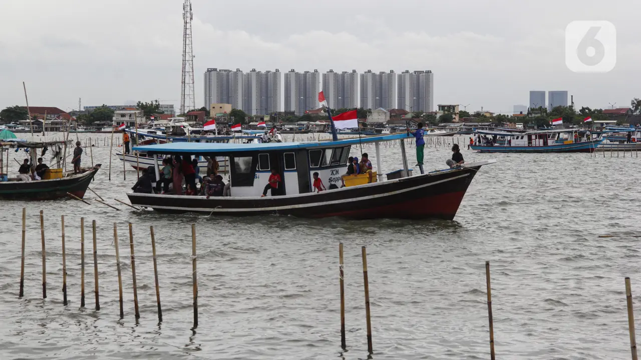 Secara Serentak, Ribuan Personel Gabungan Bersama Nelayan Bongkar Pagar Laut di Tangerang
