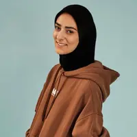 Sosok Maymi Asgari viral di TikTok karena aksi freestyle bolanya di luar stadion Doha, Qatar.