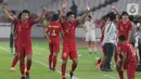Pemain Timnas Indonesia U-19 merayakan hasil imbang melawan Korea Utara pada laga kualifikasi Grup K Piala AFC U-19 2020 di Stadion Utama Gelora Bung Karno, Jakarta, Minggu (10/11/2019). Indonesia lolos ke putaran Piala AFC U-19 2020 di Uzbekistan. (Liputan6.com/Helmi Fithriansyah)