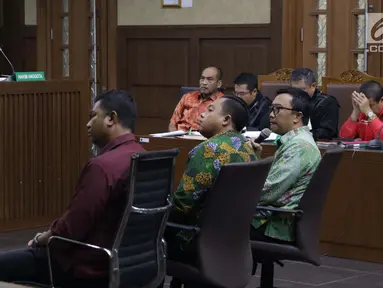 Menpora Imam Nahrawi (kedua kanan) menjadi saksi pada sidang lanjutan suap dana hibah Kemenpora untuk KONI dengan terdakwa Deputi IV Bidang Peningkatan Prestasi Kemenpora, Mulyana serta Adhi Purnomo dan Eko Triyanta di Pengadilan Tipikor, Jakarta, Kamis (4/7/2019). (Liputan6.com/Helmi Fithriansyah)