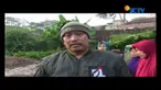 Sejumlah personil TNI diterjunkan untuk membantu membersihkan sisa-sisa banjir yang menerjang kawasan Tarogong Kidul