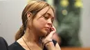 Lindsay Lohan sendiri menghabiskan beberapa waktu tak terlihat dan berpergian untuk kembali menemukan dirinya usai beberapa skandal. (DAVID MCNEW  GETTY IMAGES NORTH AMERICA  AFP)