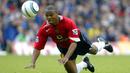 Quinton Fortune merupakan pemain Afrika pertama yang bermain di Manchester United. Ia tercatat berkarier di Old Trafford selama tujuh tahun dan pernah berbagi ruang ganti bersama Ronaldo pada kurun 2003-2006. Kini, ia ditunjuk sebagai pelatih Reading. (AFP/Carl De Souza)
