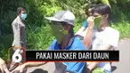 Ada saja aksi menggelitik warga Indonesia. Demi menghindari razia, dua warga ini gunakan daun sebagai masker penutup hidung dan mulut agar bisa lolos dari pos penyekatan.