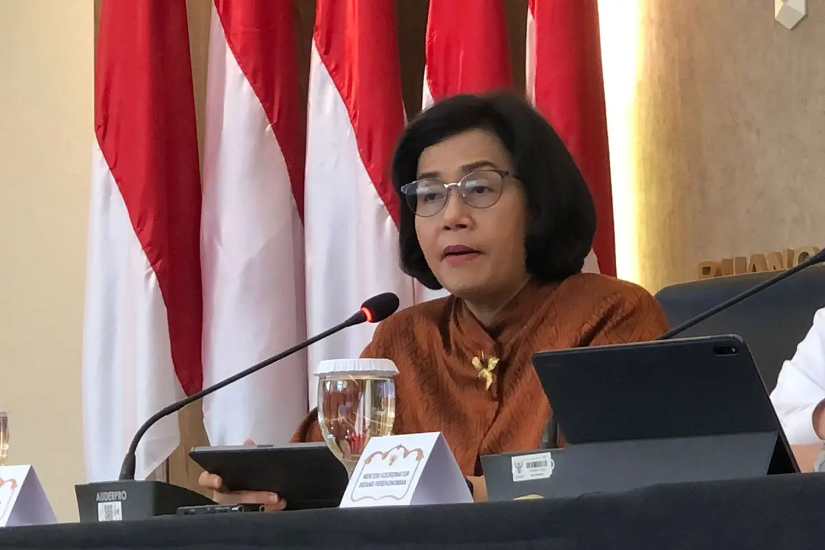 Menteri Keuangan (Menkeu) Sri Mulyani Indrawati dalam konferensi pers Devisa Hasil Ekspor (DHE), di kantor Kementerian Bidang Perekonomian, Jumat (28/7/2023). (Tira/Liputan6.com)