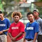 Pitcher timnas softball Indonesia, Nelwan Yumame (tengah merah). (Liputan6.com/Ahmad Akbar Fua)