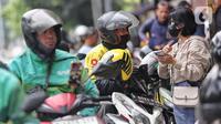 Sebelumnya, diberitakan bahwa pemerintah melalui Kementerian Perhubungan (Kemenhub) berencana menaikkan tarif ojek online (ojol) atau daring sebesar 8 hingga 15 persen. (Liputan6.com/Angga Yuniar)