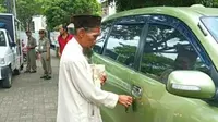 Pengemis di Bogor tepergok memiliki mobi