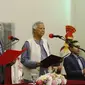 Presiden Bangladesh Mohammed Shahabuddin mengambil sumpah jabatan Muhammad Yunus sebagai kepala pemerintahan sementara, di Dhaka, Kamis (8/8/2024). (Dok. AP/Rajib Dhar)