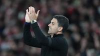 Wajah bahagia terpancar dari Mikel Arteta setelah Arsenal berhasil meraih kemenangan penting saat menjamu Burnley dalam lanjutan Premier League 2025/2026. Bermain di Emirates Stadium, Selasa (19/5/2026) dini hari WIB, The Gunners menang tipis 1-0 lewat gol Kai Havertz. (AP Photo/Kirsty Wigglesworth)