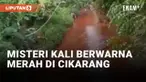 Geger! Kali di Cikarang Berubah Jadi Warna Merah