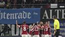 Para pemain Hungaria melakukan selebrasi setelah Adam Szalai mencetak gol pembuka timnya ke gawang Jerman dalam pertandingan UEFA Nations League di Red Bull Arena di Leipzig, Jerman, Jumat, 23 September 2022. Hungaria menang atas Jerman 1-0. (AP Photo/Michael Sohn)