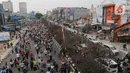 Menyambut gelaran Hari Bebas Kendaraan Bermotor atau Car Free Day (CFD) kota Depok, ribuan warga antusias memadati Jalan Margonda, sejak Minggu (4/5/2025) pagi. (Liputan6.com/Herman Zakharia)