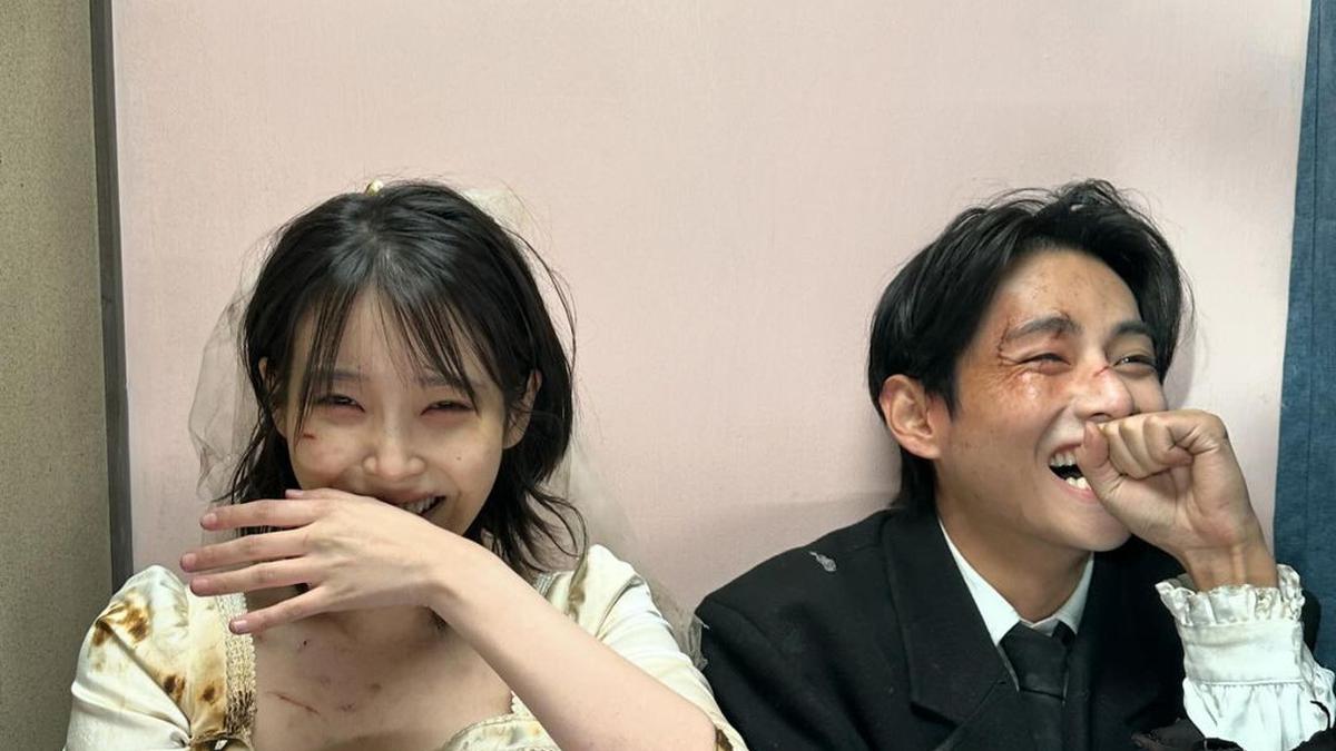 Potret Keakraban IU dan V BTS di Balik Layar MV Love Wins All yang Sukses Besar