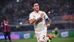 Milan menggandakan keunggulan 2-0 pada menit ke-35 setelah Bologna bermain dengan 10 pemain sejak menit ke-20. Davide Clabria mencatatkan namanya di papan skor usai memanfaatkan bola buangan Lukasz Skorupski yang tidak sempurna. (AFP/Marco Bertorello)