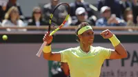 Ekspresi Rafael Nadal usai mengalahkan Roger Federer di semifinal Prancis Terbuka 2019. (AP Photo/Michel Euler)