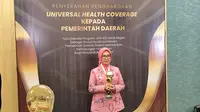 Wakil Wali Kota Bontang, Najirah dalam kegiatan penyerahan penghargaan Universal Health Coverage (UHC) ke Pemerintah Daerah, Kamis (8/8/2024) di The Krakatau Grand Ballroom, Taman Mini Indonesia Indah (TMII), Jakarta.