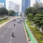 Arus lalu lintas di sejumlah ruas jalan protokol DKI Jakarta yang biasanya padat terpantau lenggang pada Selasa (12/3/2024) siang. (Liputan6.com/Angga Yuniar)