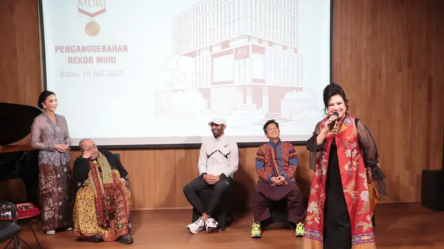 Ervinna kembali mencatatkan prestasi dengan meraih rekor MURI.