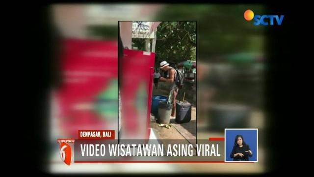 Viral, video seoarnag wisatawan asing mengais makanan di tempat sampah di kawasan Wisata Sanur Denpasar Bali.