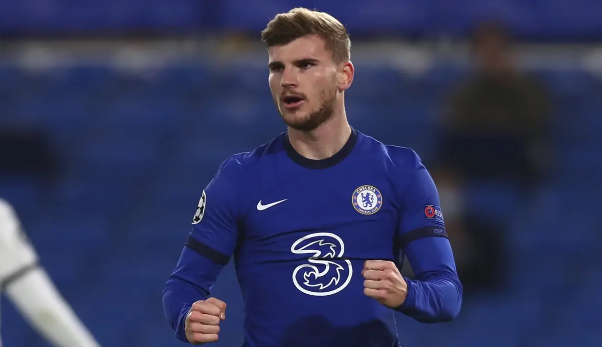 Penyerang Chelsea, Timo Werner, merayakan gol yang dicetaknya ke gawang Rennes pada laga lanjutan Liga Champions 2020/2021 di Stadion Stamford Bridge, Kamis (5/11/2020) dini hari WIB. Chelsea menang 3-0 atas Rennes. (Clive Rose/Pool via AP)