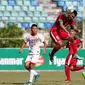 Striker Timnas Indonesia M Rafli melakukan sundulan ke gawang Brunei Darussalam dalam laga penyisihan Grup B Piala AFF U-18, pada Rabu (13/9/2017) sore. (Liputan6.com / Yoppy Renato)