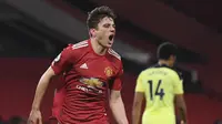 Winger Manchester United atau MU Daniel James merayakan golnya ke gawang Newcastle United dalam lanjutan Liga Inggris di Old Trafford, Senin (22/2/2021) dini hari WIB. (Stu Forster/Pool via AP)