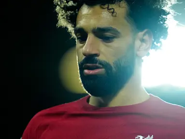 Pemain Liverpool Mohamed Salah berlari saat melawan Real Madrid pada pertandingan sepak bola leg pertama babak 16 besar Liga Champions di Stadion Anfield, Liverpool, Inggris, 21 Februari 2023. Real Madrid mengalahkan Liverpool dengan skor 5-2. (AP Photo/Jon Super)