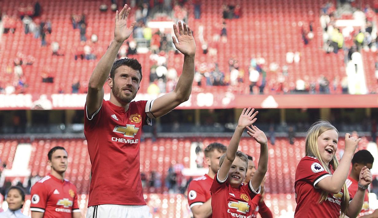 Bersama Manchester United, Michael Carrick bertahan selama 12 musim. Pada akhir musim 2017/2018 ia memutuskan pensiun setelah memperkuat Setan Merah dalam 464 laga dengan mencetak 24 gol dan 27 assist. (AFP/Oli Scarff)