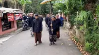 Arak-arakan tapa bisu dan jamasan pusaka pada perayaan lebaran Idul Fitri, kelompok Kejawen Kalitanjung, Rawalo, Banyumas, Jawa Tengah. (Foto: Liputan6.com/Eddy Wahono)