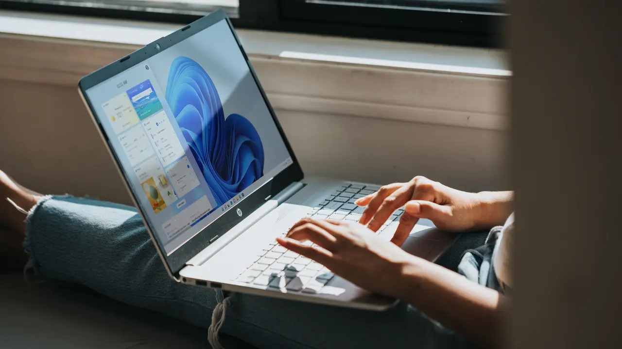 Person working on Windows 11 computer