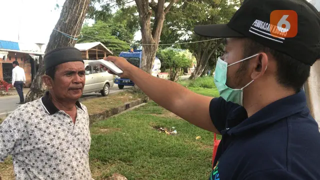 Pemeriksan suhu tubuh di perbatasan Sulteng