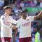 Pemain Arsenal Noni Madueke merayakan gol yang dicetaknya bersama rekan setimnya Kai Havertz (kiri) pada laga Premier League/Liga Inggris antara Crystal Palace vs Arsenal di London, Minggu, 24 Mei 2026. (AP Photo/Kin Cheung)