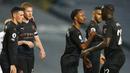 Para pemain Manchester City merayakan gol yang dicetak oleh Raheem Sterling ke gawang Leeds United pada laga Liga Inggris di Stadion Elland Road, Sabtu (3/10/2020). Kedua tim bermain imbang 1-1. (Cath Ivill/Pool via AP)
