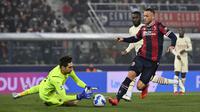 Bologna bahkan mendapatkan peluang emas pada menit ke-78. Tembakan Marko Arnautovic dari jarak dekat masih dapat diblok kiper AC Milan, Ciprian Tatarusanu. (LaPresse via AP/Massimo Paolone)
