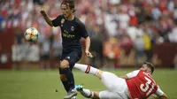 Aksi Luka Modric saat Real Madrid menant atas Arsenal (AP)