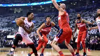 Aksi DeMar DeRozan saat Raptors kalahkan Wizards di gim kelima play-off NBA (AP)