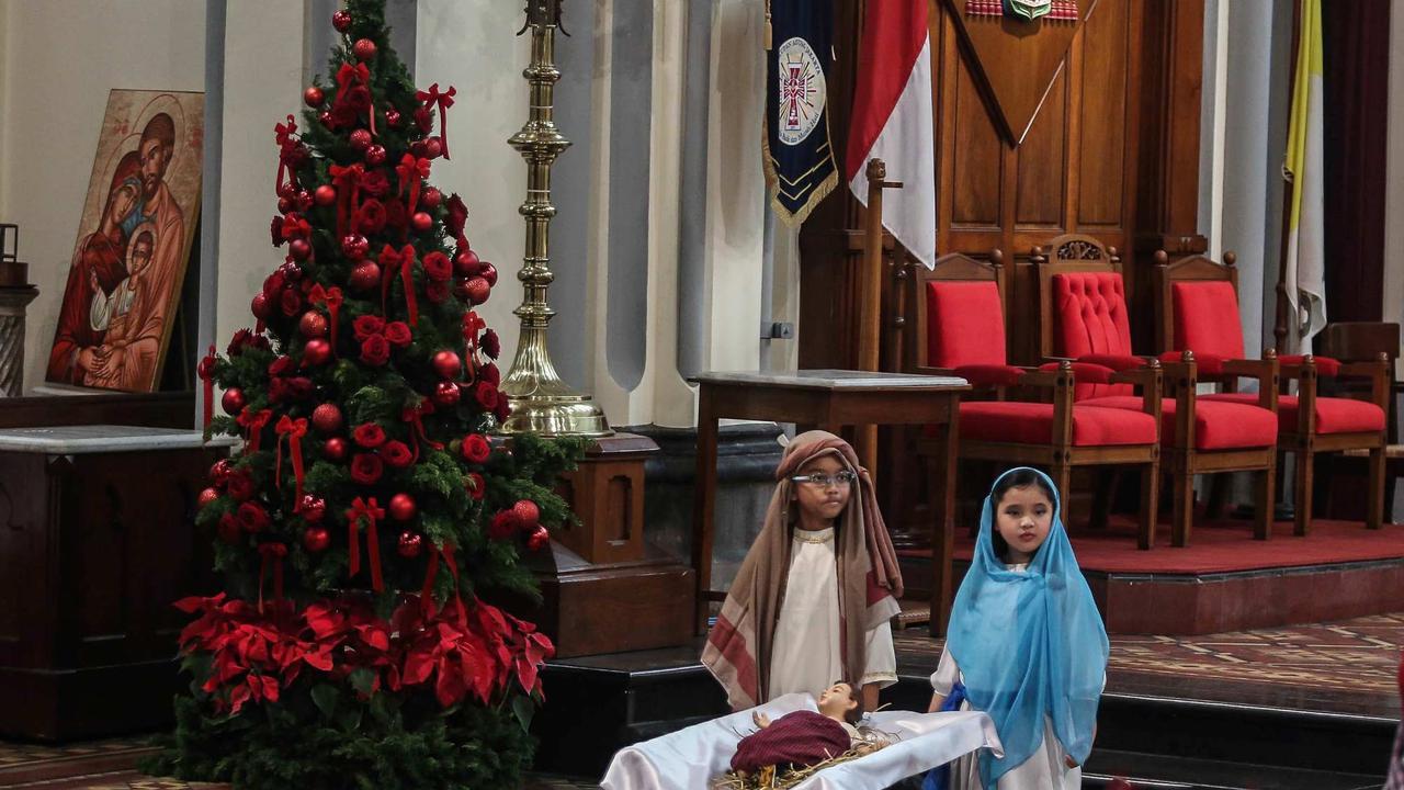 Keceriaan Anak-Anak Ikuti Misa Natal di Gereja Katedral Jakarta