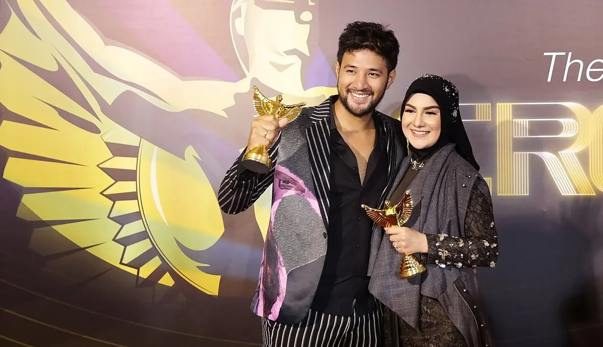 Ammar Zoni dan Irish Bella Raih Penghargaan FFI 2019. (Bambang E Ros/Fimela.com)