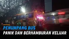 Penumpang bus yang panik akan datangnya kereta akhirnya berhamburan keluar.