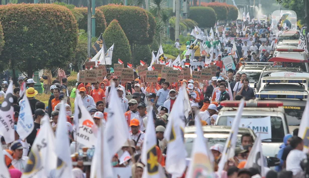 Mereka terus menyanyikan yel-yel dalam mendukung AMIN. (Liputan6.com/Angga Yuniar)