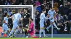 Pemain Manchester City Riyad Mahrez (kanan) melakukan selebrasi usai mencetak gol ke gawang Fulham dari titik penalti pada pertandingan sepak bola putaran keempat Piala FA di Etihad Stadium, Manchester, Inggris, 5 Februari 2022. Manchester City menang 4-1. (AP Photo/Jon Super)