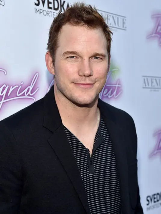 Uniknya, aktor The Jurassic World ini menuturkan bahwa dirinya tidak diundang dalam acara ini. Mengatakan hal itu, Chris Pratt sambl bercanda saat berbincang dengan juru kamera yang mengabadikan dirinya. (AFP/Alberto E.Rodriguez)