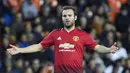 Sang ayah awalnya juga seorang pesepak bola pada tahun 1980 an. Kini Juan Mata akan memeperpanjang kontraknya di Man United lewat komando sang ayah. (AFP/Jose Jordan)