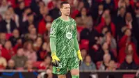 Wojciech Szczesny dalam pertandingan tandang Barcelona melawan Benfica pada laga leg pertama 16 besar Liga Champions 2024/2025 di Estadio do Sport Lisboa e Benfica, Kamis dini hari WIB (6-3-2025). (Bola.com/ X FC Barcelona)