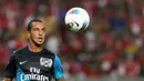 Theo Walcott turut menyumbang gol untuk Arsenal yang melumat Malaysia 4-0 dalam laga pramusim Tur Asia 2011 di Stadion Bukit Jalil, Kuala Lumpur, 13 Juli 2011. AFP PHOTO/Mohd Rasfan
